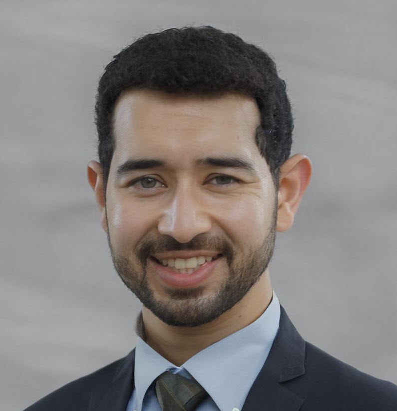 Ayham Dahlan - headshot reduced