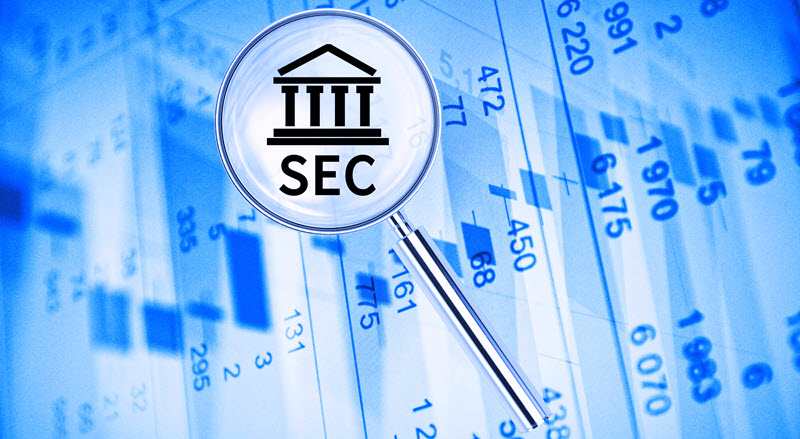 SEC magnifying glass blue hubspot-1