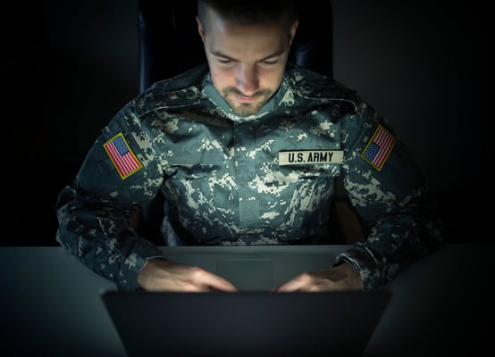 US Army soldier on laptop