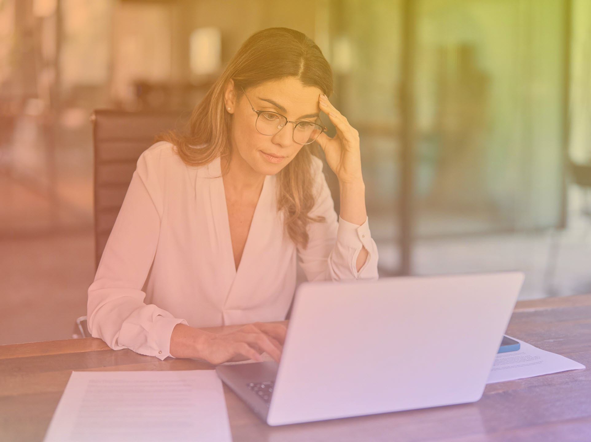 business woman frustrated at computer website