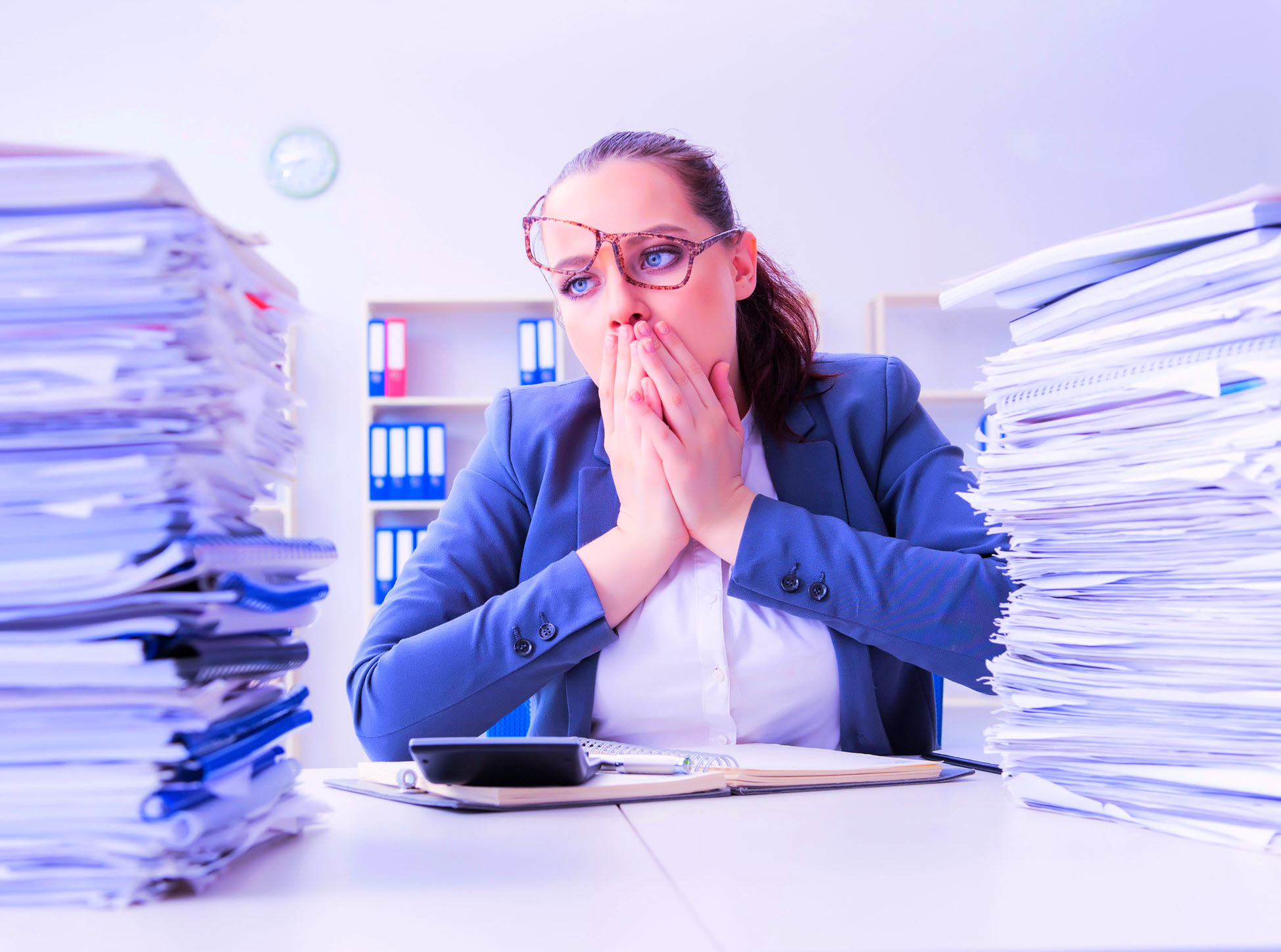 female office worker too much paperwork website