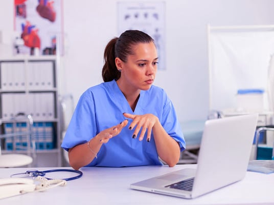 health care worker on computer hubspot