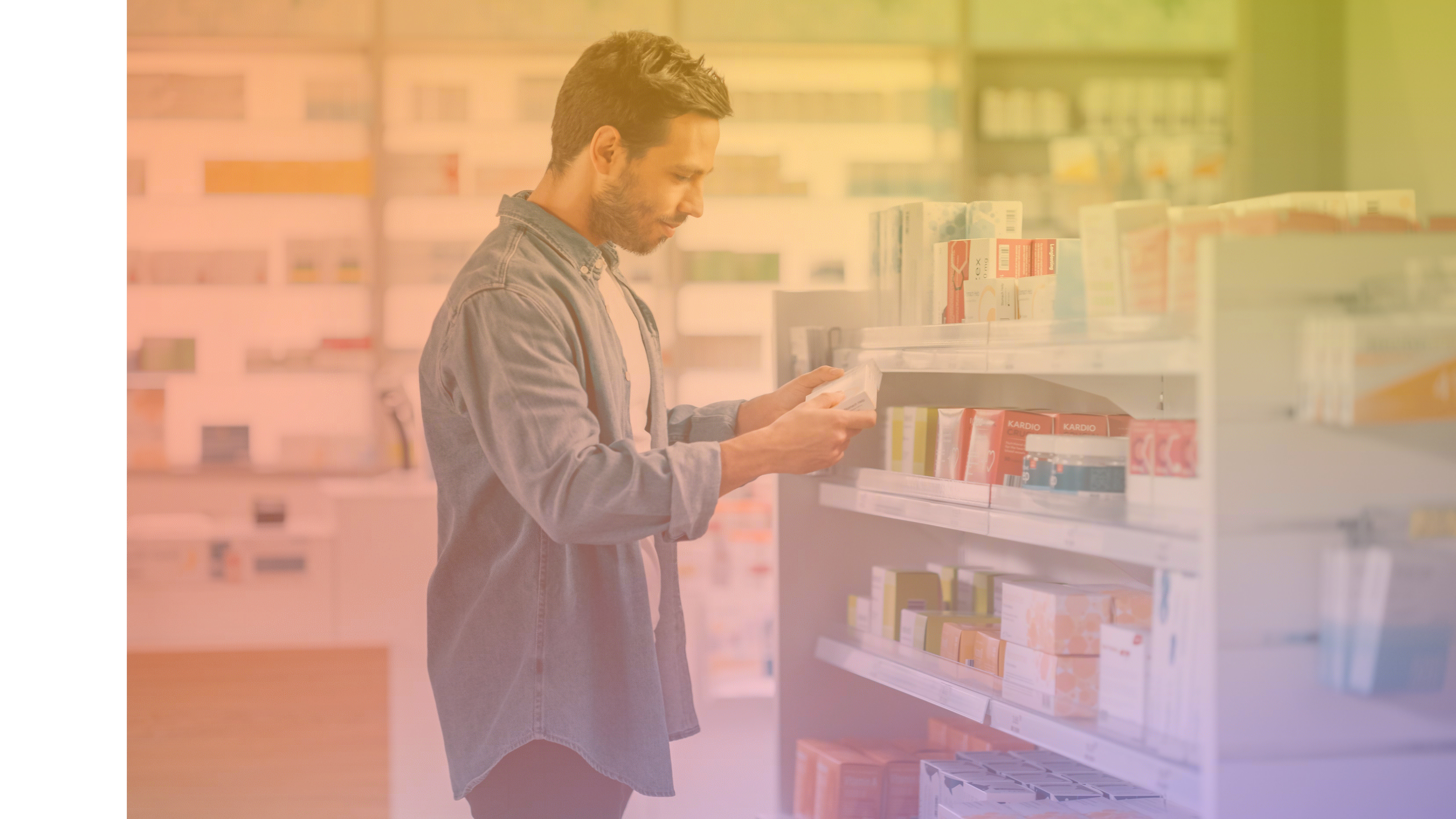man in drug store reviewing product