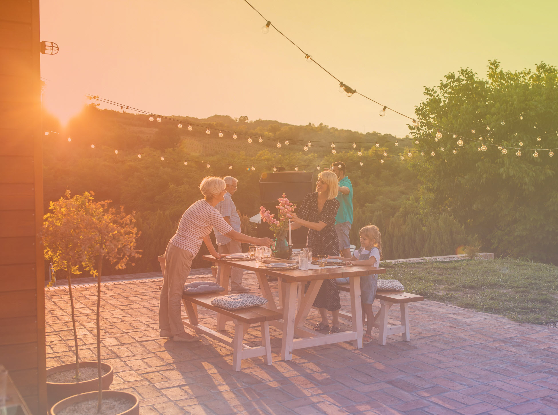 multi generation family outdoor meal website