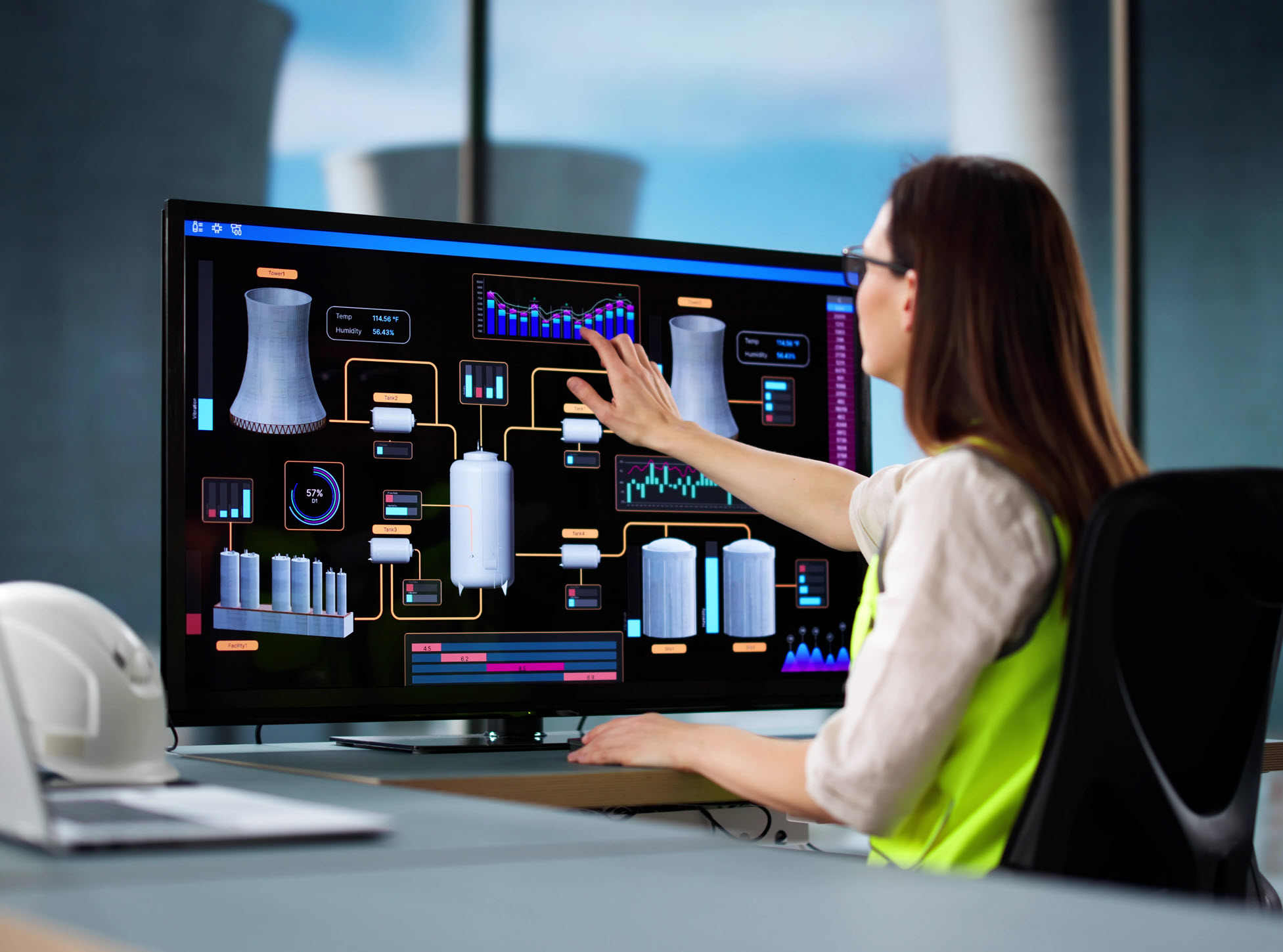woman at control center of nuclear power plant hubspot